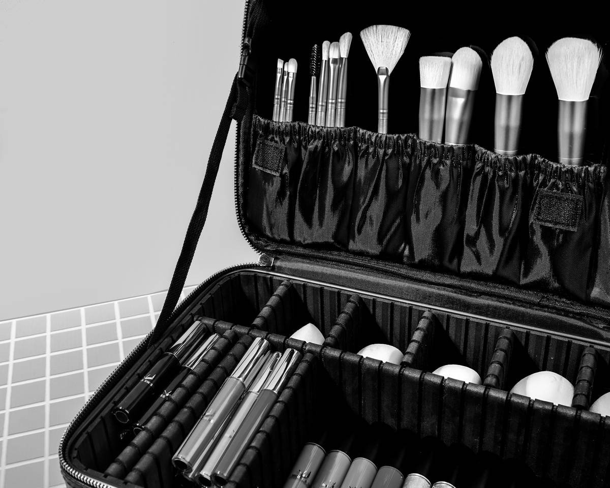 Organized makeup bag case with labeled compartments and travel-friendly size