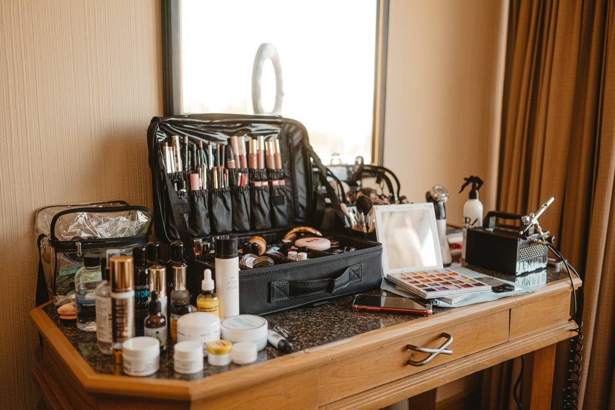 Side-by-side comparison of essential makeup kit stored in cheap vs premium makeup bags showing organization and protection differences